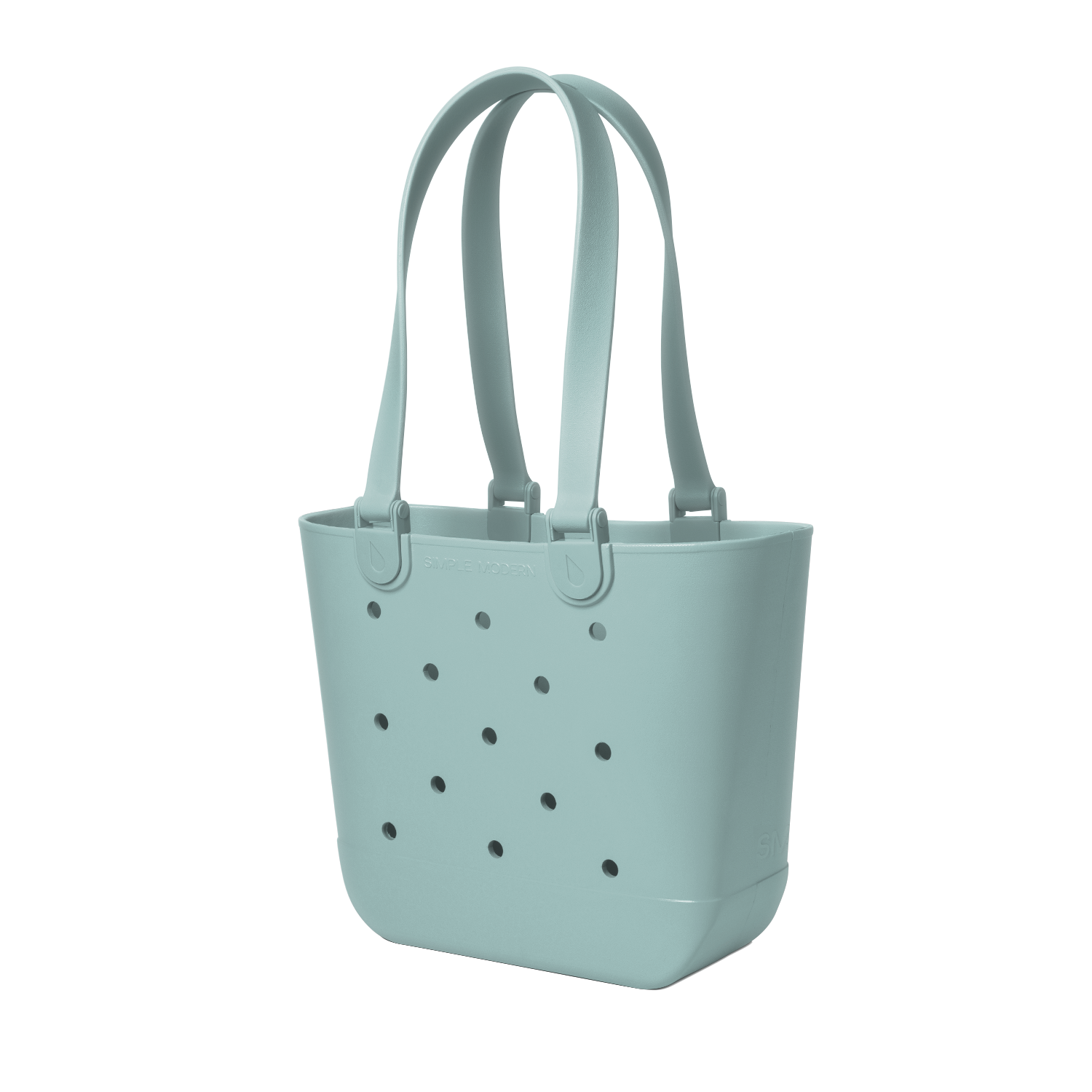 Soft sage green tote bag with small dark gray circular details, viewed from front