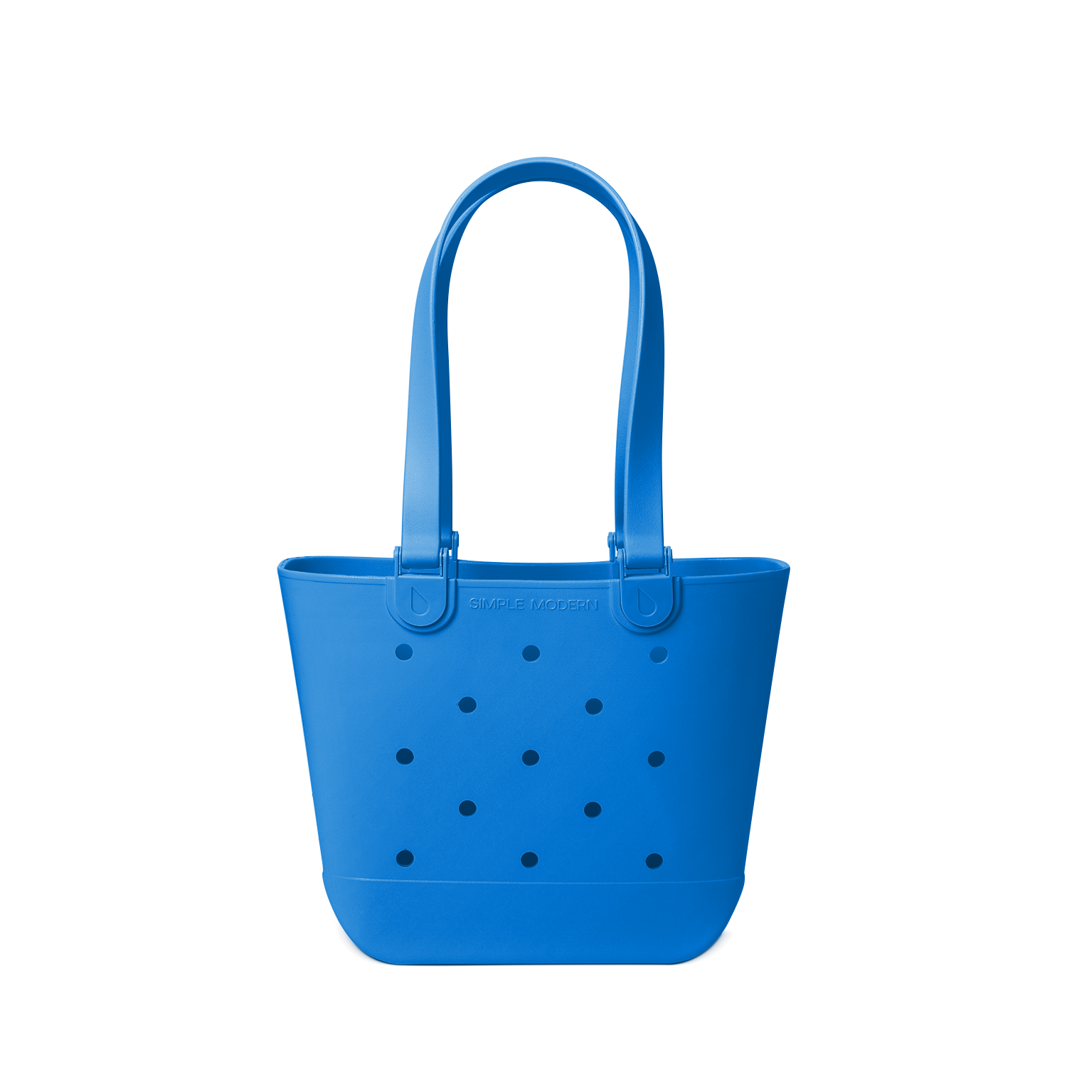 Royal blue tote bag with navy polka dots on off-white background