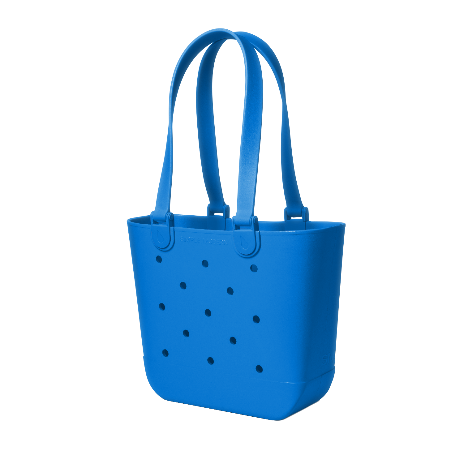 Blue tote bag with perforated details, viewed from the front. The bag features a solid royal blue color with small holes throughout the design.