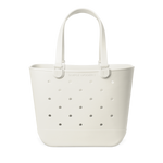Cream-colored silicone tote bag with gray circular perforations pattern