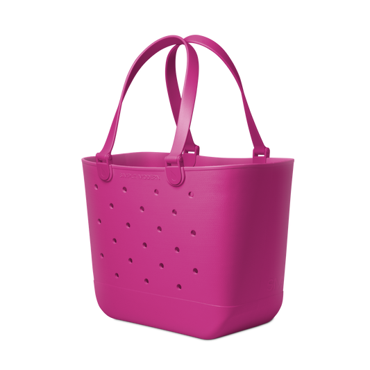 Vibrant hot pink magenta tote bag displayed against a clean white background