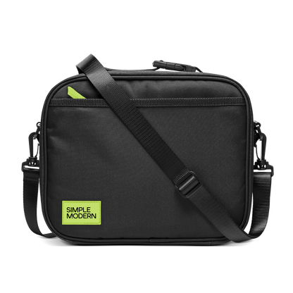 Black shoulder bag with neon yellow-green accent details and hardware