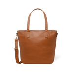 Brown leather tote bag with gold-toned metal hardware, front view on white background