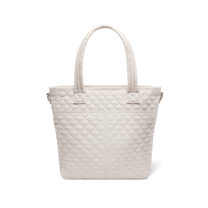 Cream quilted tote bag with soft, warm off-white color displayed against a white background, shown from the back view.