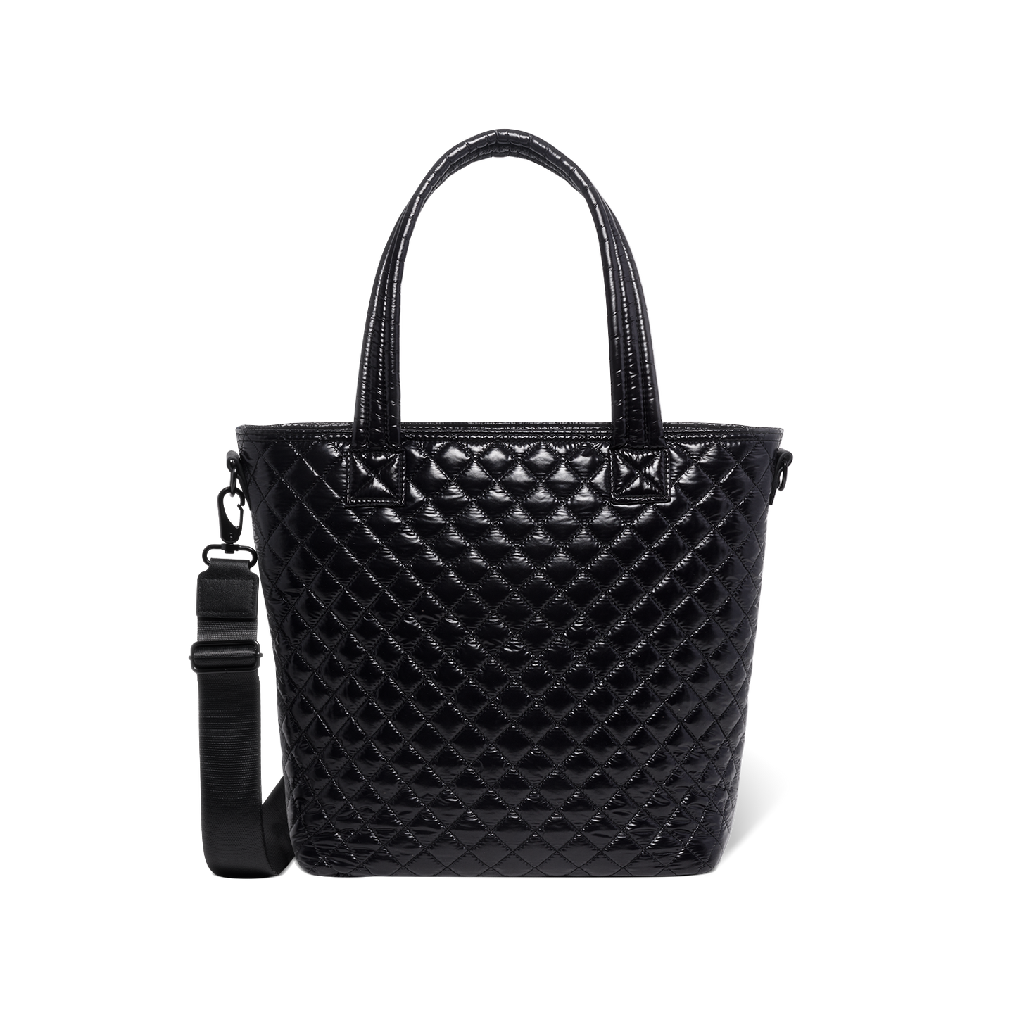 Black quilted handbag with light reflections on white background