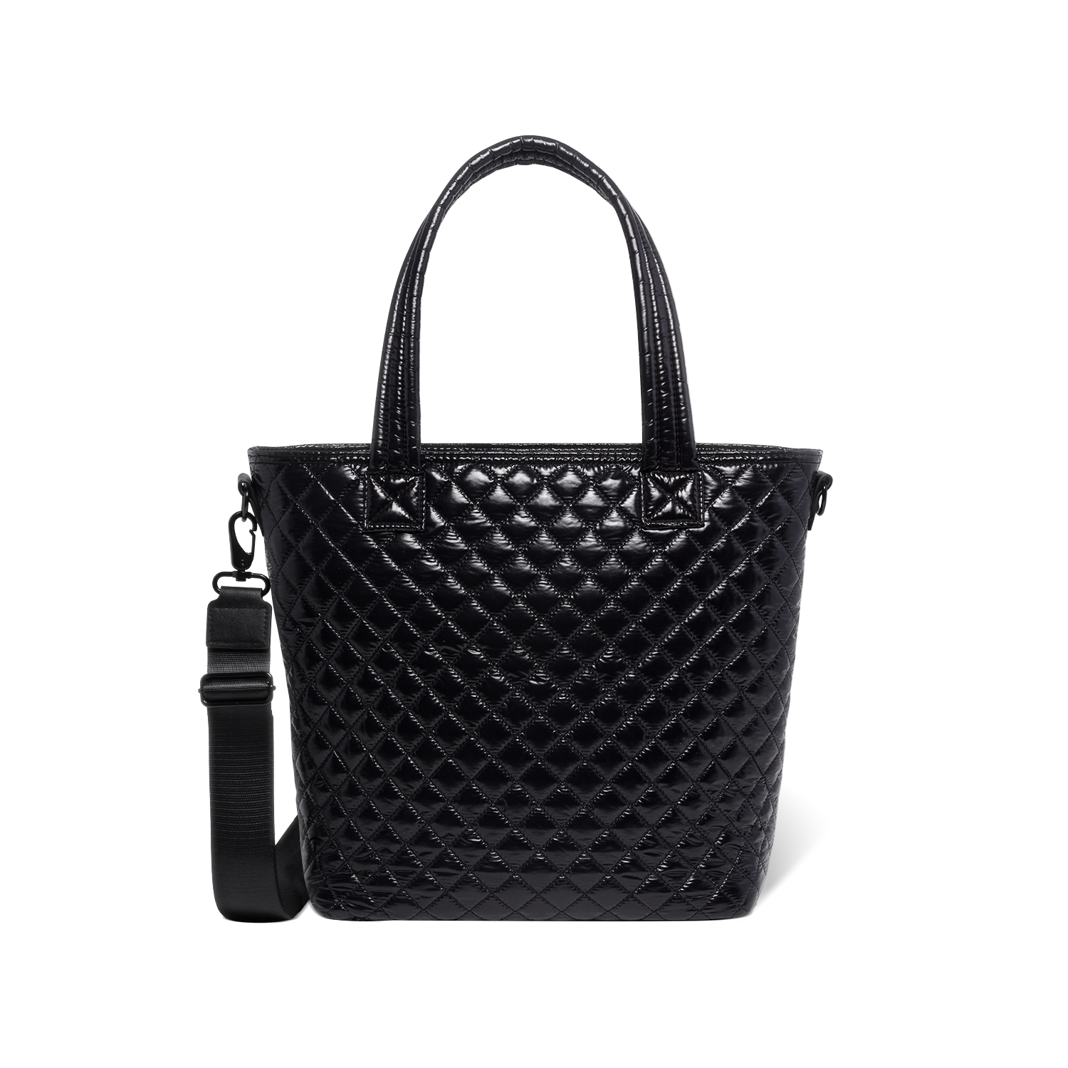 Black quilted handbag with light reflections on white background