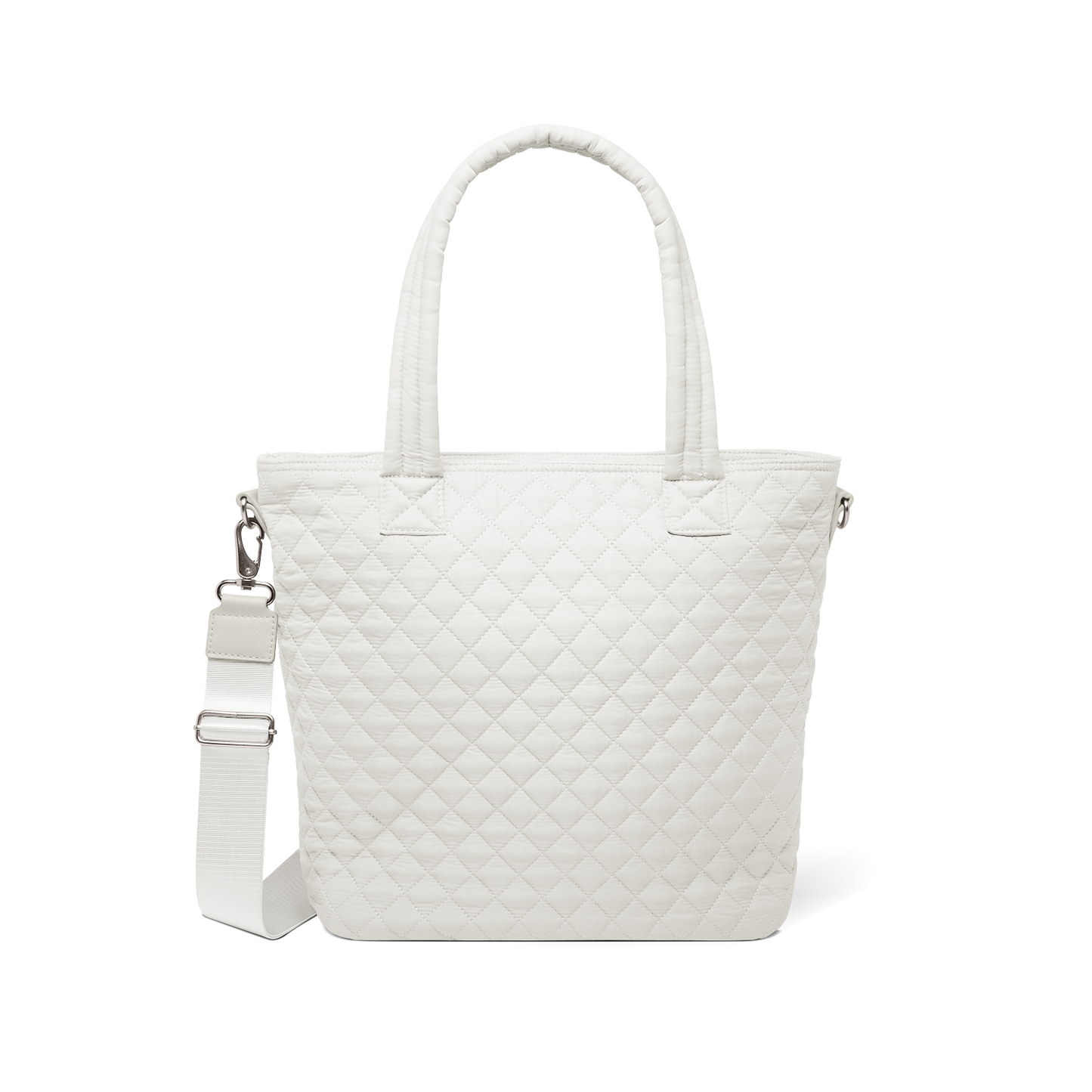 Cream-colored quilted tote bag with dual white handles against a white background