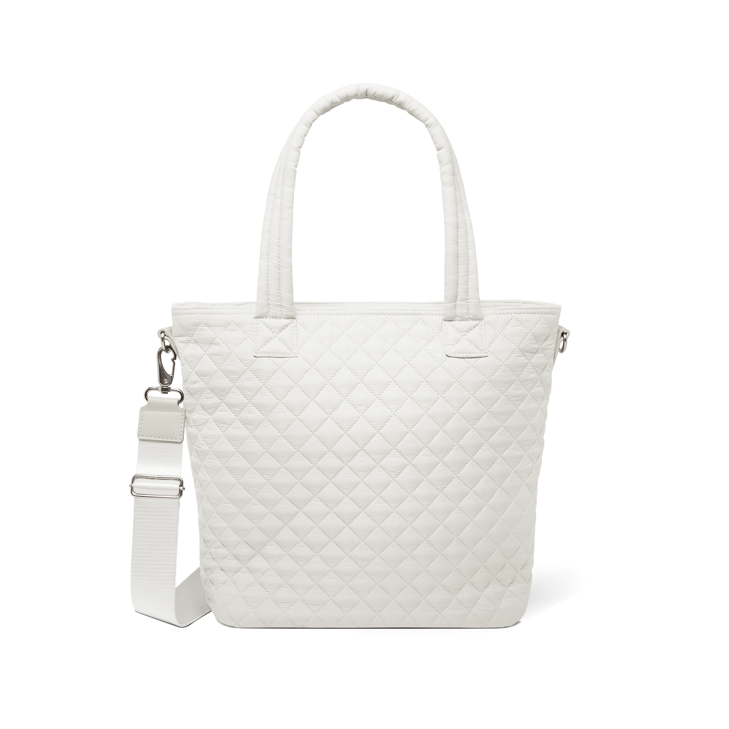 Cream-colored quilted tote bag with dual white handles against a white background