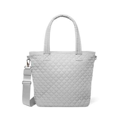 Off-white tote bag with brushed silver D-ring and adjustable strap hardware