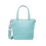 Soft aqua mint green tote bag with silver metal hardware and handles, front view