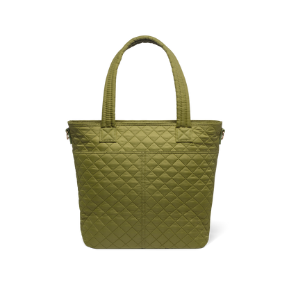 Olive-green canvas bag shown from back view, featuring muted sage tone with warm undertones, visible handles and structural seams