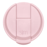 Soft pale pink flip-top lid against white background