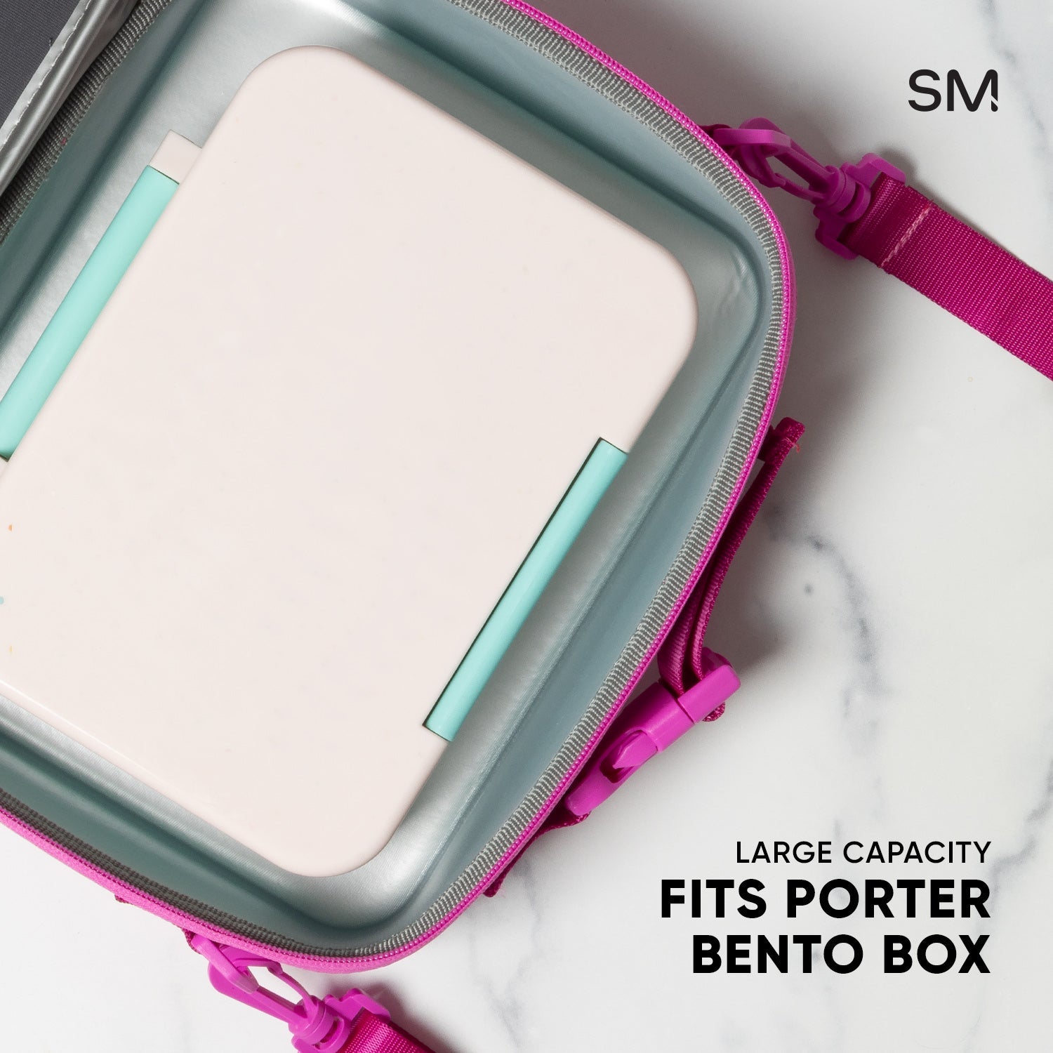 Magenta pink hardshell zippered pouch with sage green body, showing fitted bento-style compartments inside.