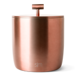 Brushed rose gold and copper metallic surface with light reflections, transitioning from peachy tones on the left to deeper bronze hues on the right.