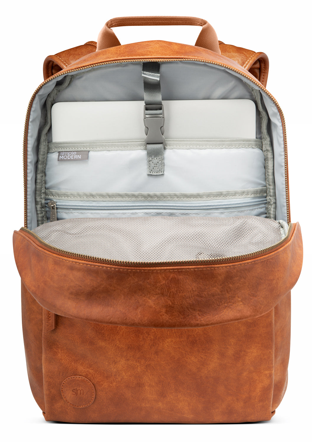 Cognac brown leather backpack with gray-blue interior lining, displaying cream and light gray compartments inside