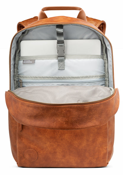 Cognac brown leather backpack with gray-blue interior lining, displaying cream and light gray compartments inside