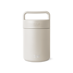 Cream-colored jar with lid on white background
