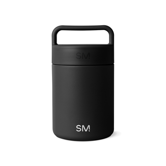 Matte black ceramic mug on white background, showcasing minimalist design and smooth finish