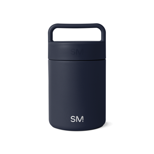 Navy blue glass jar with dark cap and handle on white background