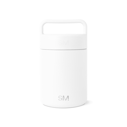 White cylindrical storage jar with minimalist design and clean lines on light gray background