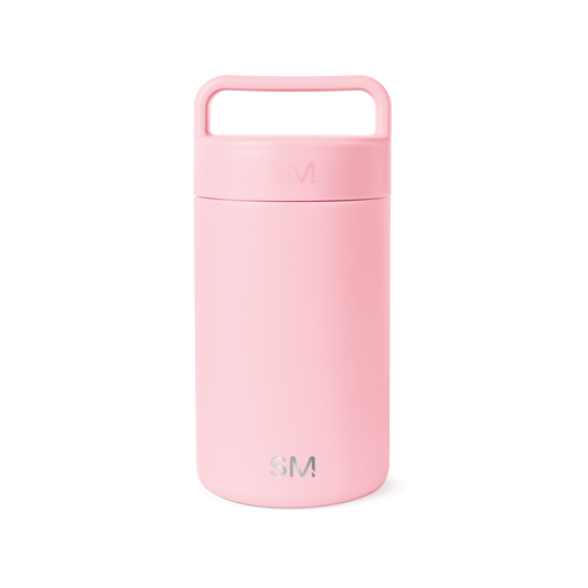 Soft pale pink ceramic jar with lid against white background