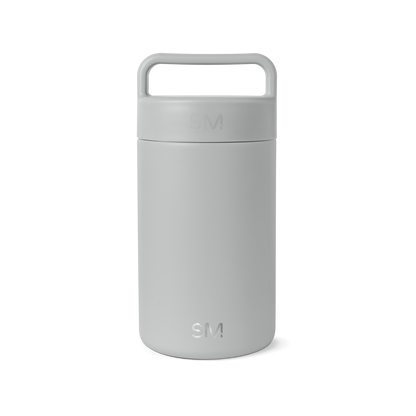 Light gray cylindrical jar container with uniform pale finish and subtle tonal variations created by its cylindrical form and ridged texture