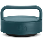 Muted teal jar lid with dark charcoal base against clean white background