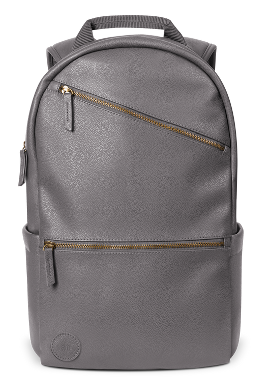 Gray canvas backpack with gold-toned metal hardware and zippers