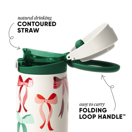 Cream-colored cookware with forest green lid and handle, featuring a vibrant red and pink decorative bow on the front.