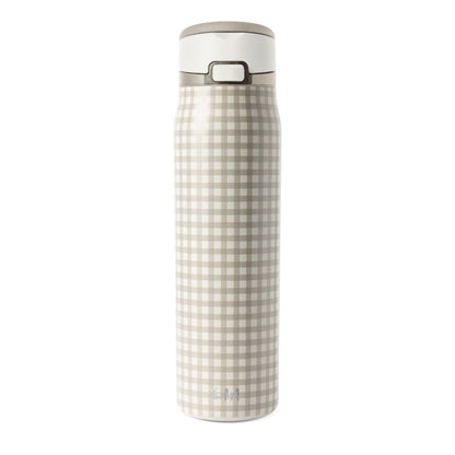 Beige and cream insulated water bottle with white lid and cap