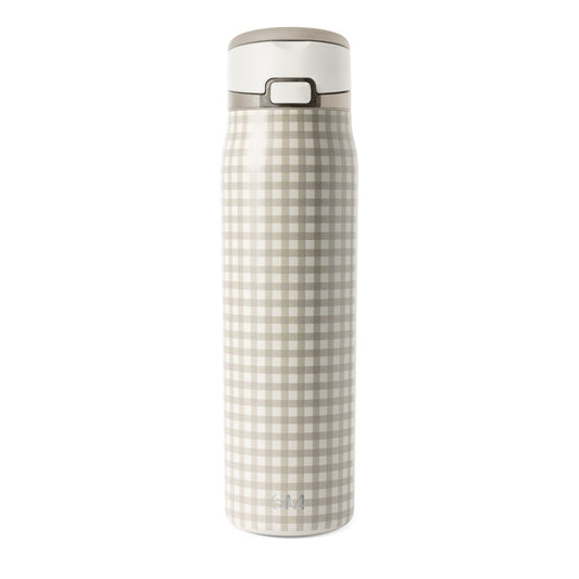 Beige and cream insulated water bottle with white lid and cap