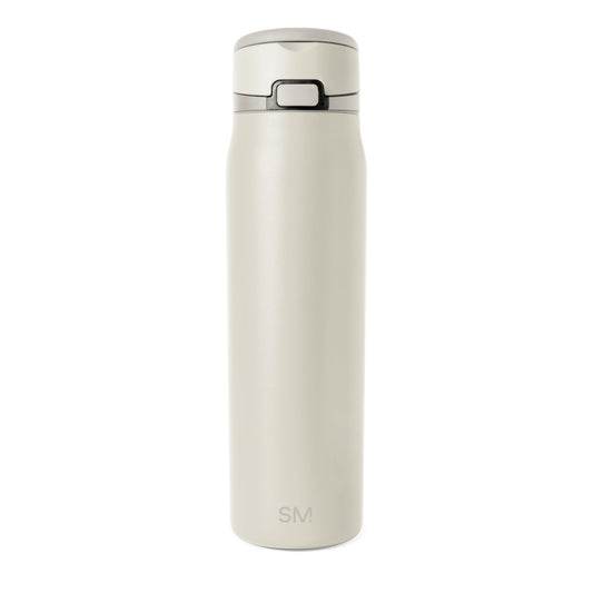 Cream-colored water bottle with gray charcoal lid and band accents, displayed against a neutral background