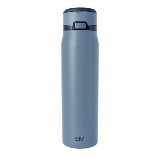 Small insulated travel bottle with grayish-blue matte finish, featuring a matching lid and accent band for a minimalist design.