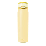 Cream-colored insulated water bottle with gold-tone cap and carry loop, featuring Simple Modern SM logo, shown against white background.