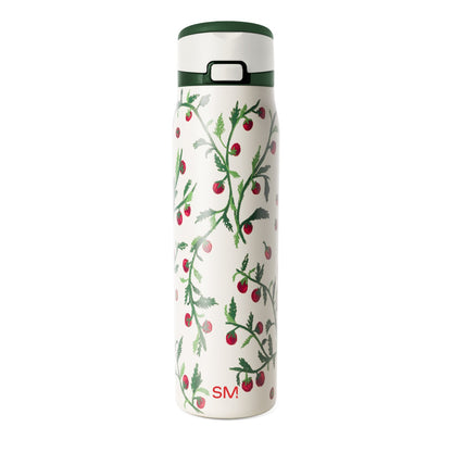 Cream-colored product packaging with dark forest green text and graphics, featuring bright red raspberries with pink highlights as decorative elements.