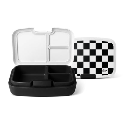 Three Simple Modern lunch containers with black and white compartmentalized bases and lids displayed against a white background. One features a checkered lid with the SM logo.