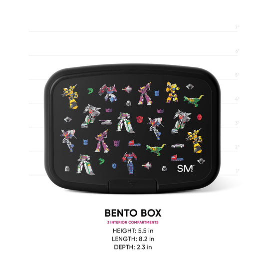 Black Simple Modern bento box with colorful Transformers character graphics on lid, shown with measurement scale. 3 interior compartments. Height 5.5", length 8.2", depth 2.3".