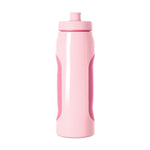 Light pink squeeze bottle with hot pink contoured grip sections on sides and matching cap