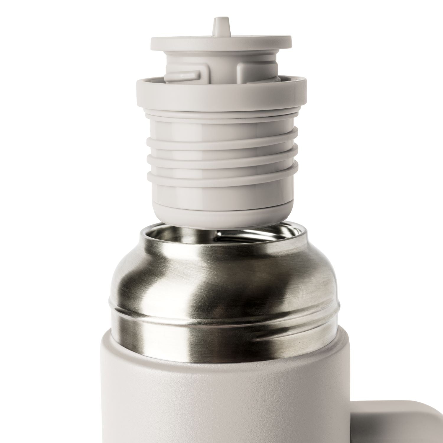 Off-white and cream-colored product with brushed stainless steel silver accents, cream tones dominating upper portion