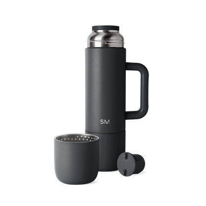 Deep charcoal black and dark gunmetal gray drinkware set with matte finish and brushed metal accents