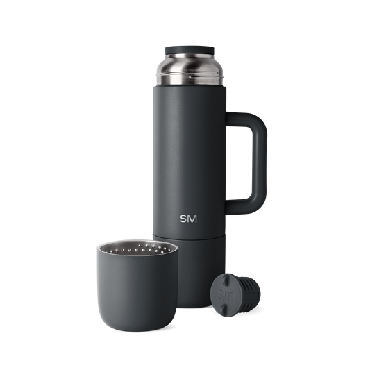 Deep charcoal black and dark gunmetal gray drinkware set with matte finish and brushed metal accents