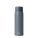 Slate gray water bottle with matching gray cap and spout mechanism, featuring a muted storm gray finish for a sophisticated neutral aesthetic.