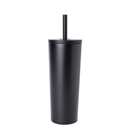 Matte black reusable cup with matching black straw on white background