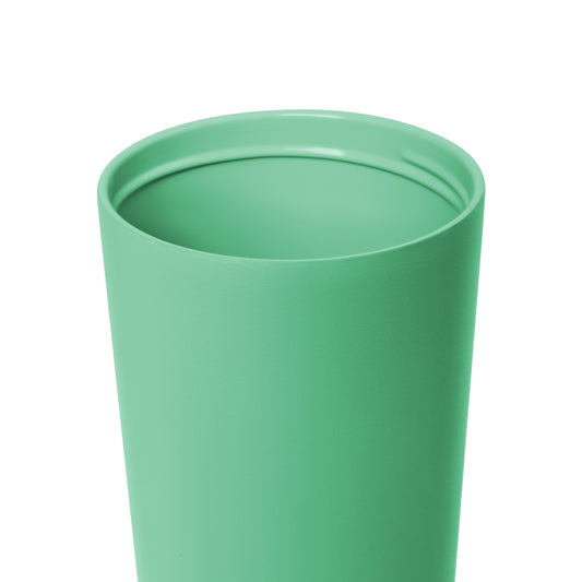 Soft mint green product against white background