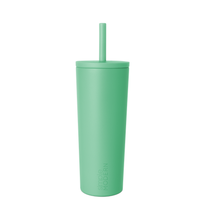Pale mint green tumbler with lid on white background