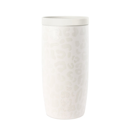 White cylindrical beverage tumbler with subtle embossed leopard print texture pattern