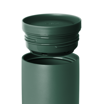 Muted sage green container with matching lid shown against white background