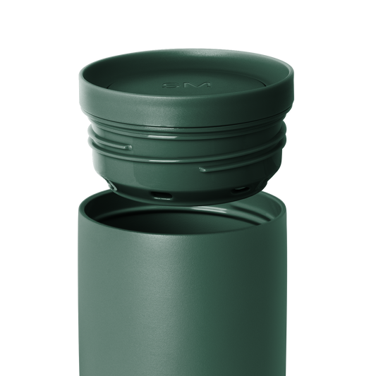 Muted sage green container with matching lid shown against white background