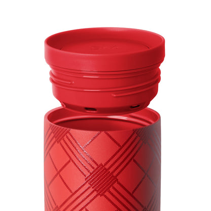 Red hydration bottle with separated lid, showing the main bottle body and removable cap, both in bright red color