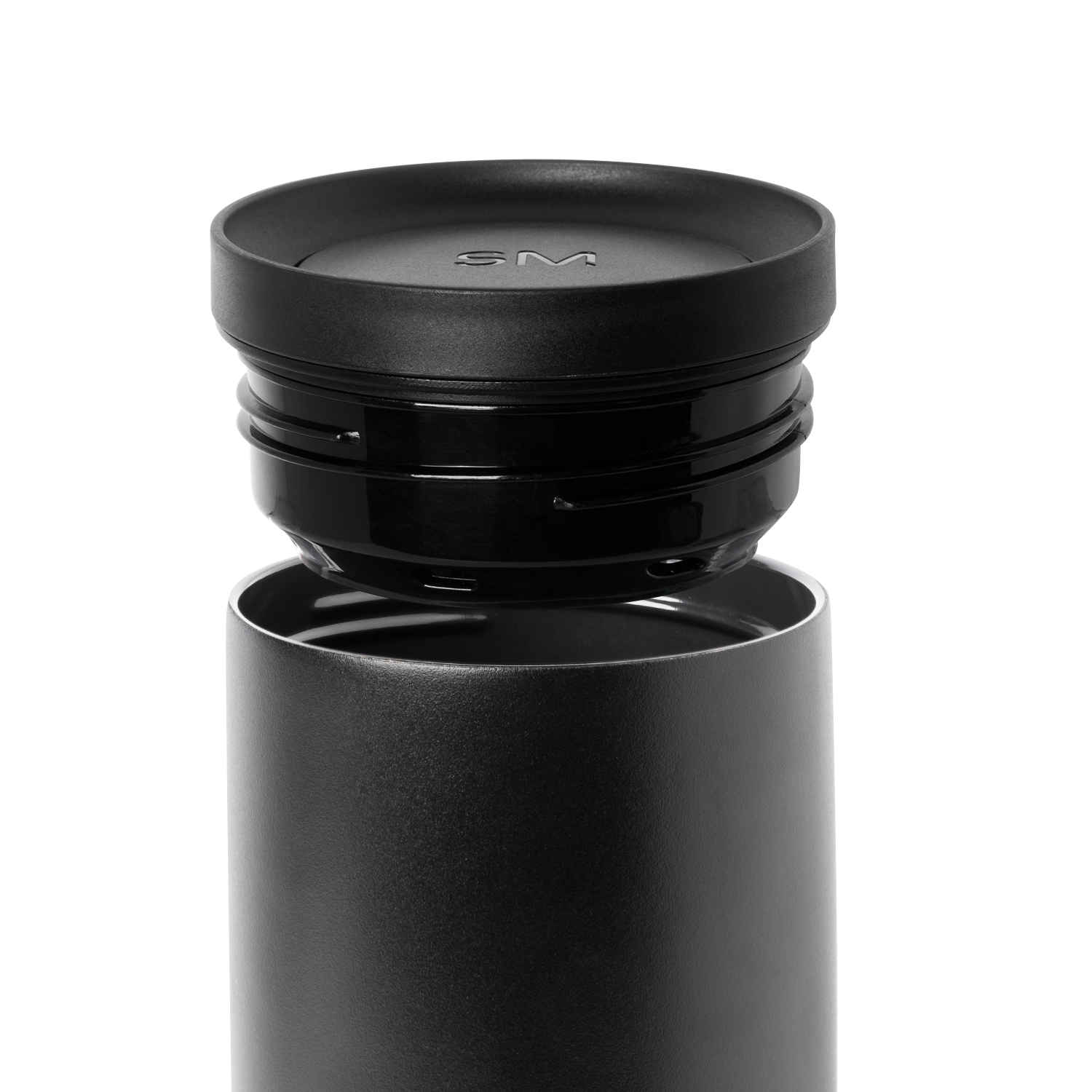 Dark gray cylindrical container with matte finish and removable black lid, shown against white background.